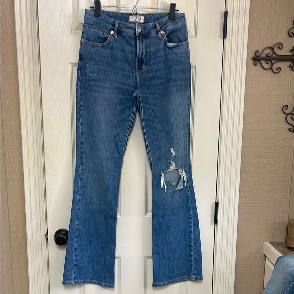 We The Free Blue Flare Jeans with Distressed Style